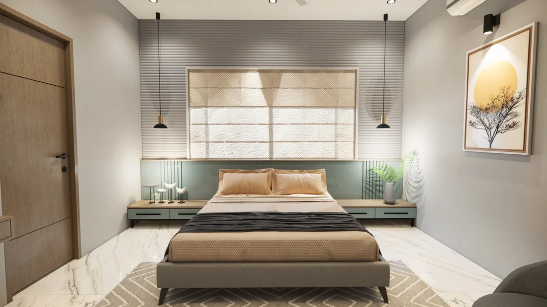 A bedroom with a sage headboard, pendant lights, a window blind and warm neutral bedding.